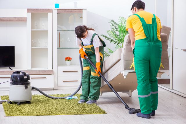 Cleaning professional contractors working at house